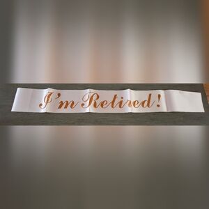 "I'm Retired!" Blush Satin Sash with Sparly Rose Gold Script